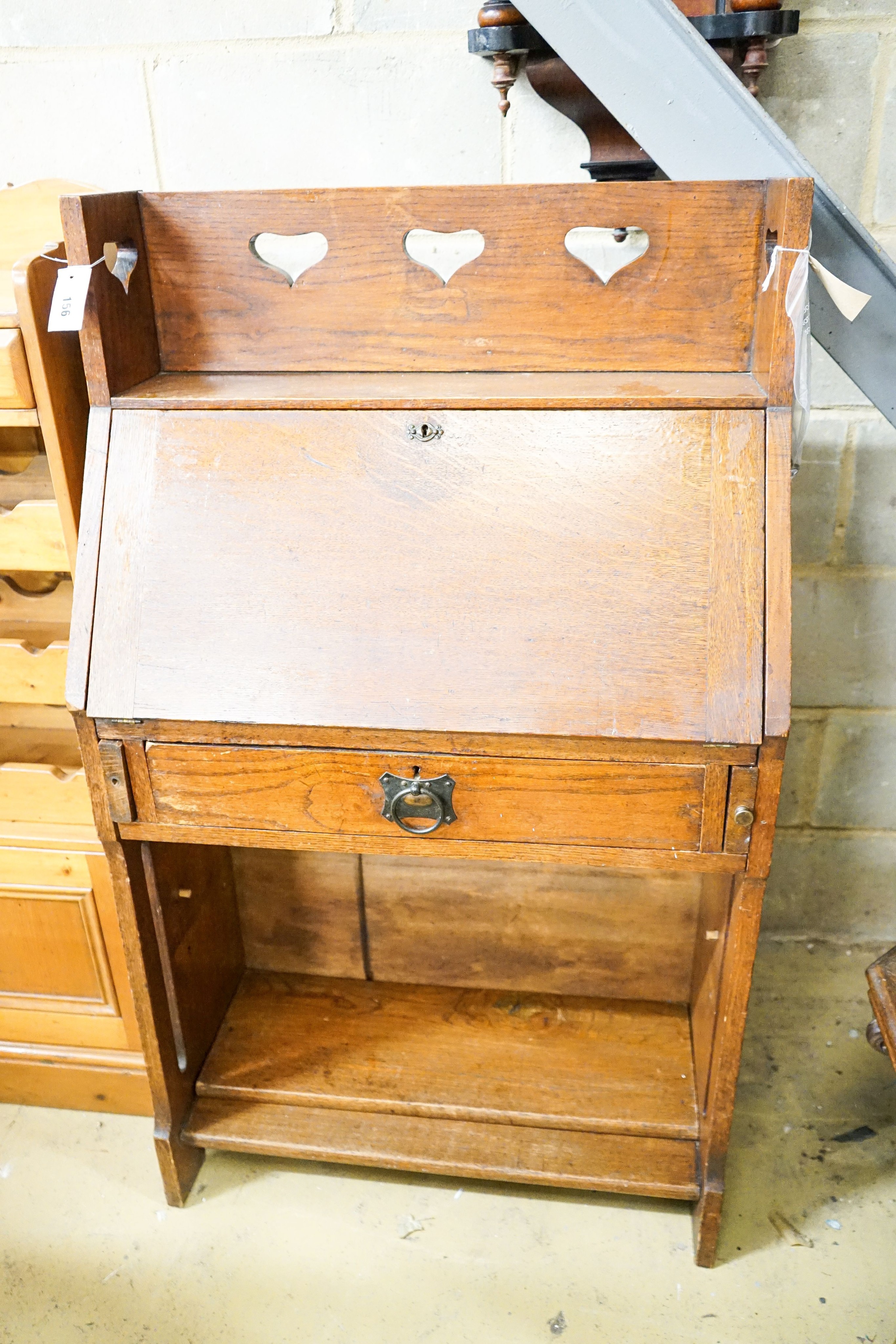 A late Victorian Art Nouveau oak bureau, width 71cm, depth 33cm, height 120cm